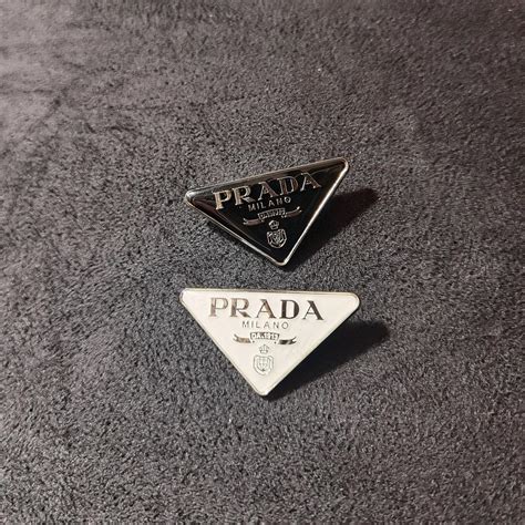 prada brooch price.